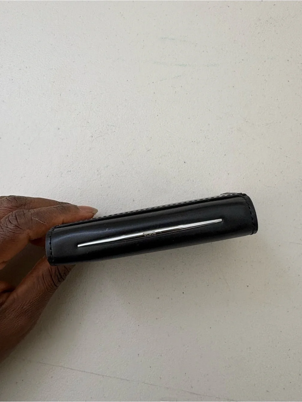 Tumi genuine leather